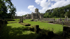 The Trust looks after 780 miles of coastline and 248,000 hectares of land, as well as its 500+ visitor sites. Pictured: Fountains Abbey, Yorkshire